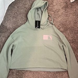 BlueLine Surf & Paddle Co. long sleeve women’s teal shirt cropped